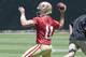 May 23, 2012; Santa Clara, CA, USA; San Francisco 49ers quarterback Alex Smith (11) throws the ball during OTAs at the 49ers practice facility. Mandatory Credit: Ed Szczepanski-US PRESSWIRE