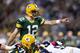 ST. LOUIS, MO - OCTOBER 21: Quarterback Aaron Rodgers #12 of the Green Bay Packers calls an audible during the game against the St. Louis Rams at the Edward Jones Dome on October 21, 2012 in St. Louis, Missouri. (Photo by David Welker/Getty Images)