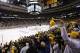 April 25, 2012; Boston, MA, USA; Boston Bruins fans cheers as the team takes the ice before the start of the first period in game seven of the 2012 Eastern Conference quarterfinals against the Washington Capitals at TD Garden. Mandatory Credit: Greg M. Cooper-US PRESSWIRE