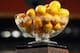 MIAMI GARDENS, FL - JANUARY 04: A detail of the Orange Bowl trophy filled with oranges which was won by West Virginia Mountaineers after their 70-33 win against the Clemson Tigers during the Discover Orange Bowl at Sun Life Stadium on January 4, 2012 in Miami Gardens, Florida. (Photo by Streeter Lecka/Getty Images)