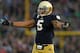 SOUTH BEND, IN - OCTOBER 20: Manti T'eo #5 of the Notre Dame Fighting Irish encourages the crowd to cheer against the BYU Cougars at Notre Dame Stadium on October 20, 2012 in South Bend, Indiana. Notre Dame defeated BYU 17-14. (Photo by Jonathan Daniel/Getty Images)