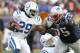 FOXBORO, MA - DECEMBER 4: Joseph Addai #29 of the Indianapolis Colts is stopped by Vince Wilfork #75 of the New England Patriots in the second half at Gillette Stadium on December 4, 2011 in Foxboro, Massachusetts. (Photo by Jim Rogash/Getty Images)