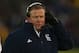 SOUTH BEND, IN - NOVEMBER 03: Head coach Brian Kelly of the Notre Dame Fighting Irish talks to coaches on the headphones during a game against the Pittsburgh Panthers at Notre Dame Stadium on November 3, 2012 in South Bend, Indiana. Notre Dame defeated Pittsburgh 29-26 in triple overtime. (Photo by Jonathan Daniel/Getty Images)