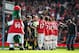 LONDON, ENGLAND - FEBRUARY 26: Arsenal players shake hands with the officials and Tottenham players prior to the Barclays Premier League match between Arsenal and Tottenham Hotspur at Emirates Stadium on February 26, 2012 in London, England. (Photo by Clive Mason/Getty Images)