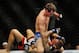 Apr 21, 2012; Atlanta, GA, USA; Rory MacDonald (top) fights Chad Mills in a welterweight bout during UFC 145 at Philips Arena. Mandatory Credit: Paul Abell-US PRESSWIRE