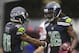 SEATTLE, WA - OCTOBER 14: Sidney Rice #18 celebrates scoring the game-tying touchdown with Golden Tate #81 of the Seattle Seahawks against the New England Patriots at CenturyLink Field on October 14, 2012 in Seattle, Washington. The Seahawks beat the Patriots 24-23. (Photo by Stephen Brashear/Getty Images)