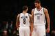 NEW YORK, NY - NOVEMBER 03: Brook Lopez #11 of the Brooklyn Nets speaks with teammate Deron Williams #8 during a game against the Toronto Raptors at the Barclays Center on November 3, 2012 in the Brooklyn borough of New York City. NOTE TO USER: User expressly acknowledges and agrees that, by downloading and/or using this photograph, user is consenting to the terms and conditions of the Getty Images License Agreement. (Photo by Alex Trautwig/Getty Images)