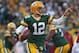 GREEN BAY, WI - NOVEMBER 04: Aaron Rodgers #12 of the Green Bay Packers points as he looks for a receiver against the Arizona Cardinals at Lambeau Field on November 4, 2012 in Green Bay, Wisconsin. The Packers defeated the Cardinals 31-17. (Photo by Jonathan Daniel/Getty Images)