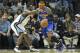 Carmelo Anthony drives to the basket against the Grizzlies on Friday night in Memphis.