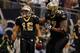NEW ORLEANS, LA - DECEMBER 04: Wide receiver Lance Moore #16 of the New Orleans Saints celebrates with offensive guard Carl Nicks #77 after scoring in the second quarter against the Detroit Lions at Mercedes-Benz Superdome on December 4, 2011 in New Orleans, Louisiana. (Photo by Chris Graythen/Getty Images)