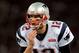 Oct 28, 2012; London, England; New England Patriots quarterback Tom Brady (12) during the 2012 International Series game at Wembley Stadium. The Patriots defeated the Rams 45-7. Mandatory Credit: Joe Toth-US Presswire