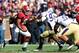 TUSCALOOSA, AL - NOVEMBER 17: Blake Sims #6 of the Alabama Crimson Tide rushes past Caleb Hawkins #93 of the Western Carolina Catamounts at Bryant-Denny Stadium on November 17, 2012 in Tuscaloosa, Alabama. (Photo by Kevin C. Cox/Getty Images)