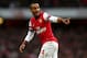 LONDON, ENGLAND - NOVEMBER 17: Theo Walcott of Arsenal celebrates his goal during the Barclays Premier league match between Arsenal and Tottenham Hotspur at Emirates Stadium on November 17, 2012 in London, England. (Photo by Clive Rose/Getty Images,)