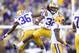November 17, 2012; Baton Rouge, LA, USA; LSU Tigers cornerback Jalen Collins (32) reacts after intercepting the ball against the Ole Miss Rebels during the first half at Tiger Stadium. Mandatory Credit: Crystal LoGiudice-US PRESSWIRE