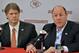December 12, 2011; Kansas City, MO, USA; Kansas City Chiefs general manager Scott Pioli (right) and chairman Clark Hunt speak during the press conference at the Kansas City Chiefs practice facility. Mandatory Credit: Denny Medley-US PRESSWIRE