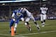 Nov 17, 2012; Lexington , KY, USA; Kentucky Wildcats quarterback Jalen Whitlow (13) runs the ball for a touchdown against Samford Bulldogs cornerback Alvin Hines (21) at Commonwealth Stadium. Mandatory Credit: Mark Zerof-US PRESSWIRE