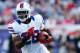 FOXBORO, MA - NOVEMBER 11: C.J. Spiller #28 of the Buffalo Bills runs with the ball against the New England Patriots during the game on November 11, 2012 at Gillette Stadium in Foxboro, Massachusetts. (Photo by Jared Wickerham/Getty Images)