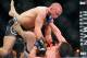 Nov 17, 2012; Montreal, QC, Canada; Georges St-Pierre (top) and Carlos Condit (bottom) battle for position during second round action of their Welterweight Championship bout at UFC 154 at the Bell Centre. Mandatory Credit: Eric Bolte-US PRESSWIRE