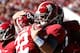 TUSCALOOSA, AL - NOVEMBER 17: AJ McCarron #10 of the Alabama Crimson Tide celebrates with Christion Jones #22 after Jones' touchdown against the Western Carolina Catamounts at Bryant-Denny Stadium on November 17, 2012 in Tuscaloosa, Alabama. (Photo by Kevin C. Cox/Getty Images)