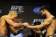 Nov 16, 2012; Montreal, QC, Canada; Georges St-Pierre (left) and Carlos Condit (right) shake hands during the weigh-in for UFC 154 at New City Gas. Mandatory Credit: Eric Bolte-US PRESSWIRE