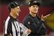 GLENDALE, AZ - OCTOBER 29: Head coach Jim Harbaugh of the San Francisco 49ers gets a laugh from Field Judge Jim Quirk during an NFL game against the Arizona Cardinals at University of Phoenix Stadium on October 29, 2012 in Glendale, Arizona. (Photo by Ralph Freso/Getty Images)