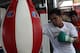 GENERAL SANTOS, PHILIPPINES - SEPTEMBER 27: Manny Pacquiao uses punch bag during a training session at Golingan Gymnasium on September 27, 2012 in General Santos, Philippines. Pacquiao will take on Mexican Juan Manual Marquez on December 8, 2012 in Las Veg2as. (Photo by Jeoffrey Maitem/Getty Images)