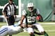 Oct 14, 2012; East Rutherford, NJ, USA; New York Jets running back Bilal Powell (29) is tackled by Indianapolis Colts defensive end Cory Redding (90) during the second quarter at MetLife Stadium. Mandatory Credit: Debby Wong-US PRESSWIRE