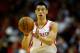 HOUSTON, TX - NOVEMBER 12: Jeremy Lin #7 of the Houston Rockets passes the ball against the Miami Heat at the Toyota Center on November 12, 2012 in Houston, Texas. NOTE TO USER: User expressly acknowledges and agrees that, by downloading and or using this photograph, User is consenting to the terms and conditions of the Getty Images License Agreement. (Photo by Scott Halleran/Getty Images)
