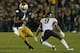SOUTH BEND, IN - NOVEMBER 17: George Atkinson II #4 of the Notre Dame Fighting Irish moves against Kevin Johnson #9 of the Wake Forest Demon Deacons at Notre Dame Stadium on November 17, 2012 in South Bend, Indiana. Notre Dame defeated Wake Forest 38-0. (Photo by Jonathan Daniel/Getty Images)