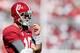 TUSCALOOSA, AL - NOVEMBER 17: AJ McCarron #10 of the Alabama Crimson Tide looks on as Blake Sims #6 runs the offense against the Western Carolina Catamounts at Bryant-Denny Stadium on November 17, 2012 in Tuscaloosa, Alabama. (Photo by Kevin C. Cox/Getty Images)