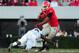 ATHENS, GA - NOVEMBER 17: Todd Gurley #3 of the Georgia Bulldogs is upended by J. J. Wicox #19 of the Georgia Southern Eagles at Sanford Stadium on November 17, 2012 in Athens, Georgia. (Photo by Scott Cunningham/Getty Images)