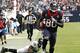 HOUSTON, TX - NOVEMBER 18: Andre Johnson #80 of the Houston Texans scores on a 48 yard reception in overtime against the Jacksonville Jaguars as Dawan Landry #26 of the Jacksonville Jaguars watches at Reliant Stadium on November 18, 2012 in Houston, Texas. Houston won 43-37 in overtime.(Photo by Bob Levey/Getty Images)