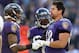Nov 11, 2012; Baltimore, MD, USA; Baltimore Ravens tight end Dennis Pitta (right) is helped to his feet following his catch and hard hit against the Oakland Raiders at M&T Bank Stadium by wide receiver Tandon Doss (left) and wide receiver Anquan Boldin (center). Mandatory Credit: Mitch Stringer-US PRESSWIRE