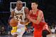 November 18, 2012; Los Angeles, CA, USA; Houston Rockets point guard Jeremy Lin (7) guards Los Angeles Lakers shooting guard Kobe Bryant (24) in the second half of the game at the Staples Center. Lakers won 119-108. Mandatory Credit: Jayne Kamin-Oncea-US PRESSWIRE