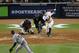 NEW YORK, NY - OCTOBER 13: Alex Rodriguez #13 of the New York Yankees swings at strike three to strike out in the bottom of the sixth inning against the Detroit Tigers during Game One of the American League Championship Series at Yankee Stadium on October 13, 2012 in the Bronx borough of New York City, New York. (Photo by Bruce Bennett/Getty Images)