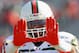 CHARLOTTESVILLE, VA - NOVEMBER 10: Running back Darris Hughes #26 of the Miami Hurricanes gesturers on the field prior to the Hurricanes game against the Virginia Cavaliers at Scott Stadium on November 10, 2012 in Charlottesville, Virginia. (Photo by Geoff Burke/Getty Images)
