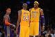 LOS ANGELES, CA - NOVEMBER 16: Dwight Howard #12 and Kobe Bryant #24 of the Los Angeles Lakers during the basketball game against Phoenix Suns at Staples Center on November 16, 2012 in Los Angeles, California. NOTE TO USER: User expressly acknowledges and agrees that, by downloading and or using this photograph, User is consenting to the terms and conditions of the Getty Images License Agreement. (Photo by Kevork Djansezian/Getty Images)