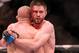 Nov 17, 2012; Montreal, QC, Canada; Carlos Condit (right) embraces Georges St-Pierre after their Welterweight Championship bout at UFC 154 at the Bell Centre. St-Pierre defeated Condit by unanimous decision. Mandatory Credit: Eric Bolte-US PRESSWIRE