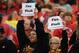 Nov 18, 2012; Kansas City, MO, USA; Kansas City Chiefs fans hold up signs to fire general manager Scott Pioli (not shown) in the second half of the game against the Cincinnati Bengals at Arrowhead Stadium. Cincinnati won the game 28-6. Mandatory Credit: John Rieger-US PRESSWIRE