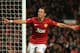 MANCHESTER, ENGLAND - OCTOBER 23: Javier Hernandez of Manchester United celebrates scoring his team's third goal to make the score 3-2 during the UEFA Champions League Group H match between Manchester United and SC Braga at Old Trafford on October 23, 2012 in Manchester, England. (Photo by Richard Heathcote/Getty Images)