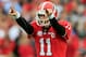 JACKSONVILLE, FL - OCTOBER 27: Aaron Murray #11 of the Georgia Bulldogs points during the game against the Florida Gators at EverBank Field on October 27, 2012 in Jacksonville, Florida. (Photo by Sam Greenwood/Getty Images)