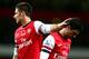 LONDON, ENGLAND - NOVEMBER 10: Mikel Arteta of Arsenal is consoled by Olivier Giroud after missing a match winning penaly kick during the Barclays Premier League match between Arsenal and Fulham at Emirates Stadium on November 10, 2012 in London, England. (Photo by Clive Rose/Getty Images,)