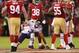 SAN FRANCISCO, CA - NOVEMBER 19: Jason Campbell #2 of the Chicago Bears gets up as he is surrounded by San Francisco 49ers after a third quarter play at Candlestick Park on November 19, 2012 in San Francisco, California. (Photo by Ezra Shaw/Getty Images)