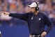 INDIANAPOLIS, IN - NOVEMBER 04: Head coach Joe Philbin points out something to his team while playing the Indianapolis Colts at Lucas Oil Stadium on November 4, 2012 in Indianapolis, Indiana. Indianapolis won the game 23-20. (Photo by Gregory Shamus/Getty Images)