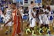 Nov 19, 2012; Lahaina, HI, USA; Chaminade Silverswords guard Lee Bailey (5) celebrates with his teammates as they defeat the Texas Longhorns during the 2012 EA SPORTS Maui Invitational at the Lahaina Civic Center. Chaminade defeats Texas 86-73. Mandatory Credit: Brian Spurlock-US PRESSWIRE
