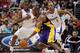 LOS ANGELES, CA - JANUARY 14: Kobe Bryant #24 of the Los Angeles Lakers is guarded by Chris Paul #3 and Caron Butler #5 of the Los Angeles Clippers during a 102-94 Clipper win at Staples Center on January 14, 2012 in Los Angeles, California. NOTE TO USER: User expressly acknowledges and agrees that, by downloading and/or using this Photograph, user is consenting to the terms and conditions of the Getty Images License Agreement. (Photo by Harry How/Getty Images)