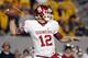 MORGANTOWN, WV - NOVEMBER 17: Landry Jones #12 of the Oklahoma Sooners drops back to pass against the West Virginia Mountaineers during the game on November 17, 2012 at Mountaineer Field in Morgantown, West Virginia. (Photo by Justin K. Aller/Getty Images)