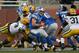 Nov 18, 2012; Detroit, MI, USA; Detroit Lions quarterback Matthew Stafford (9) runs the ball against the Green Bay Packers during the fourth quarter at Ford Field. Packers beat the Lions 24-20. Mandatory Credit: Raj Mehta-US PRESSWIRE