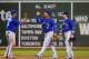 BOSTON, MA - SEPTEMBER 8: Anthony Gose #43, Colby Rasmus #28, and Yunel Escobar #5 of the Toronto Blue Jays celebrate their 9-2 win over the Red Soxo at Fenway Park on September 8, 2012 in Boston, Massachusetts. The win places the Red Sox in sole position of last place in the AL East division. (Photo by Jim Rogash/Getty Images)
