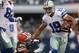 ARLINGTON, TX - NOVEMBER 18: Miles Austin #19 of the Dallas Cowboys runs the ball against Trevin Wade #26 of the Cleveland Browns at Cowboys Stadium on November 18, 2012 in Arlington, Texas. (Photo by Ronald Martinez/Getty Images)
